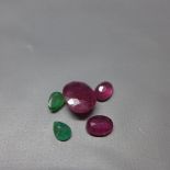 An oval cut loose ruby, approx. 4ct, together with two oval cut loose rubies, approx 1.5ct each, and