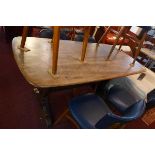 A mid 20th century Ercol elm top refectory table, H.70 W.155 D.75cm