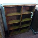 An early 20th century oak open bookcase, raised on stepped base, H.106 W.81 D.19cm