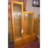 An early 20th century oak staircase bookcase, with three part glazed doors, H.182 W.122 D.32cm