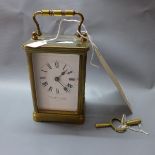 A brass carriage clock, the Roman enamel dial inscribed Walter & George, 270 Regent Circus W, the