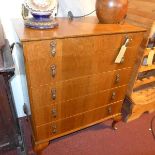 An early 20th century walnut chest, with five graduating drawers, raised on cabriole legs, H.97 W.78