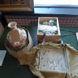 A 20th century Japanese ceramic tray in wooden container, a Japanese sake set in wooden container