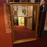A contemporary gilt framed mirror, with bevelled plate, 68 x 99cm