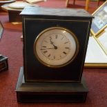 A 19th century French ebonised mantel clock, Roman enamel dial signed 'Escort, Neuvic', the ebonised