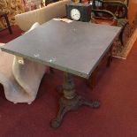 A 20th century cast iron garden table, with zinc top