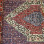 An antique qashqai kilim rug, with triple diamond medallion, geometric design, 154 x 118cm