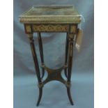 A late 19th century French mahogany jardiniere stand, with brass mounts, raised on reeded splayed