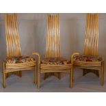 A set of eight contemporary faux bamboo dining chairs, with abstract velour drop-in seats, bearing