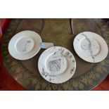 Three Poole pottery plates