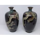 A pair of late 19th century Chinese cloisonne vases, decorated with three clawed dragon