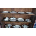 An Alfred Meakin art deco ceramic part dinner service, ton include two tureens, dinner plates,