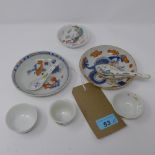 A collection of 18th century and later Chinese porcelain, to include three dishes, three sake cups