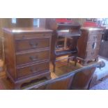 A pair of 20th century yew wood side chests, with brush slide, over three drawers, raised on bracket
