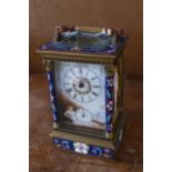 A gilt brass and cloisonne enamel carriage clock, Roman dial painted with a dove and a nude