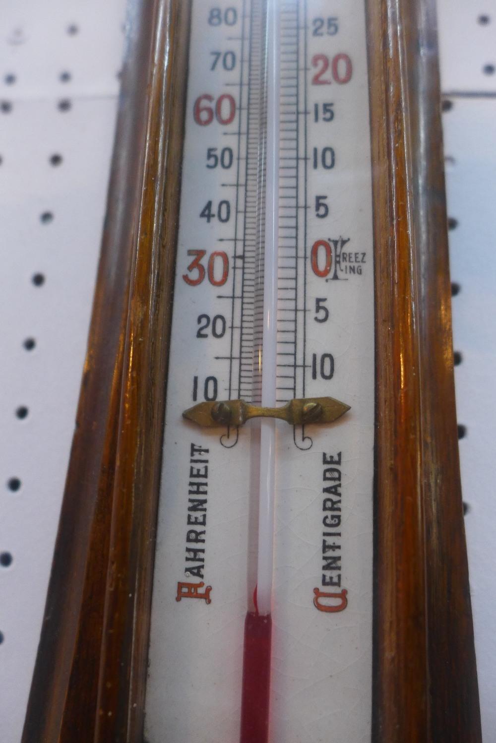 An Early 20th century oak aneroid wheel barometer with thermometer, H.84cm - Image 3 of 3