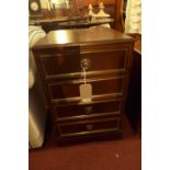 A pair of Regency style mahogany side chests, with four drawers, raised on bracket feet, H.71 W.45