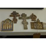 A collection of Russian brass icons, to include a brass and enamel crucifix, a larger brass