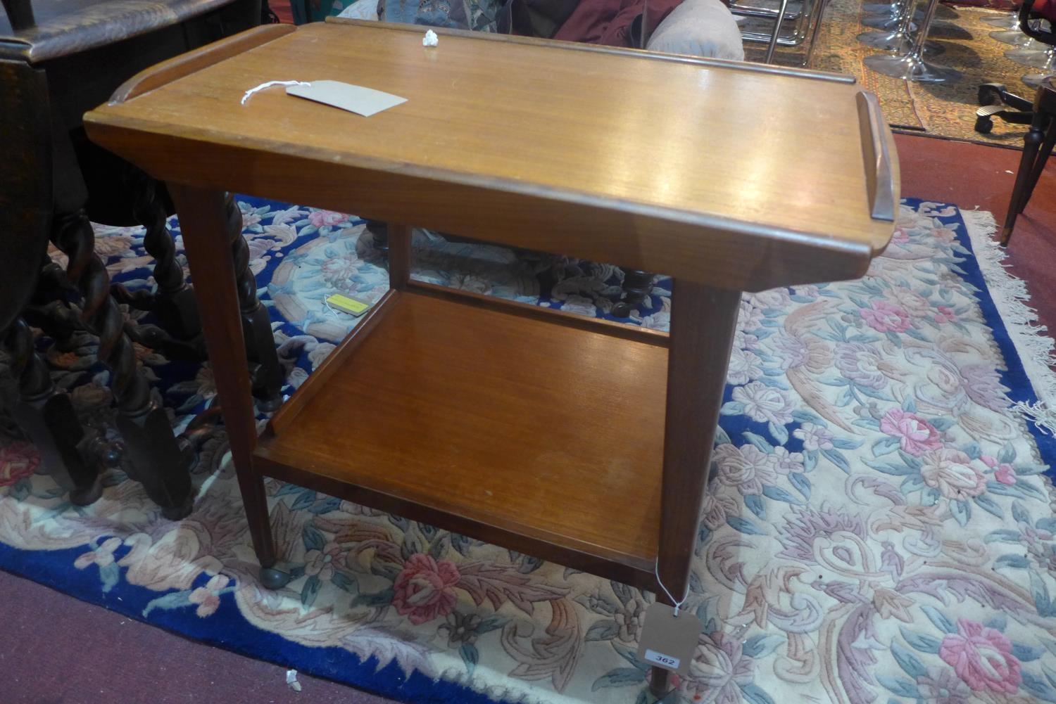 A mid 20th century teak trolley, with label for Remploy