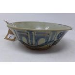 A late 19th / early 20th century Chinese terracotta bowl, blue and white glaze, decorated with