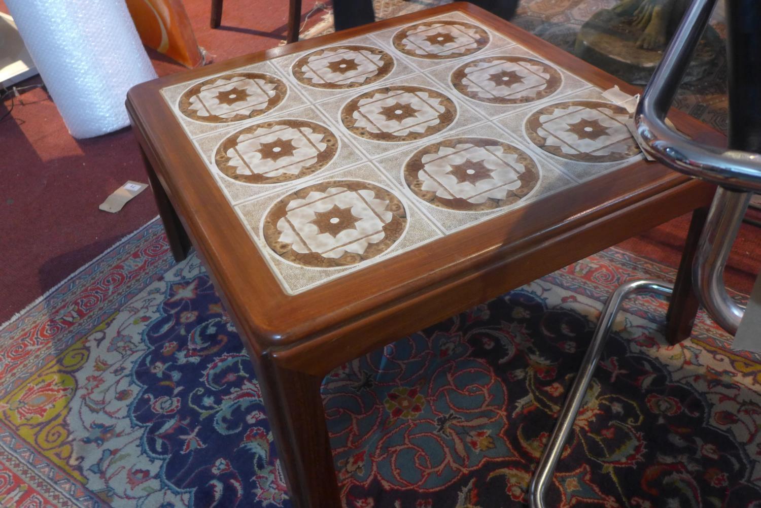 A mid 20th century teak G-plan coffee table, with tiled top, H.37 W.72 D.72cm