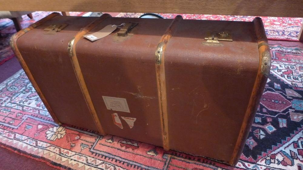 Four vintage travelling trunks, bearing Cunard White Star Line labels