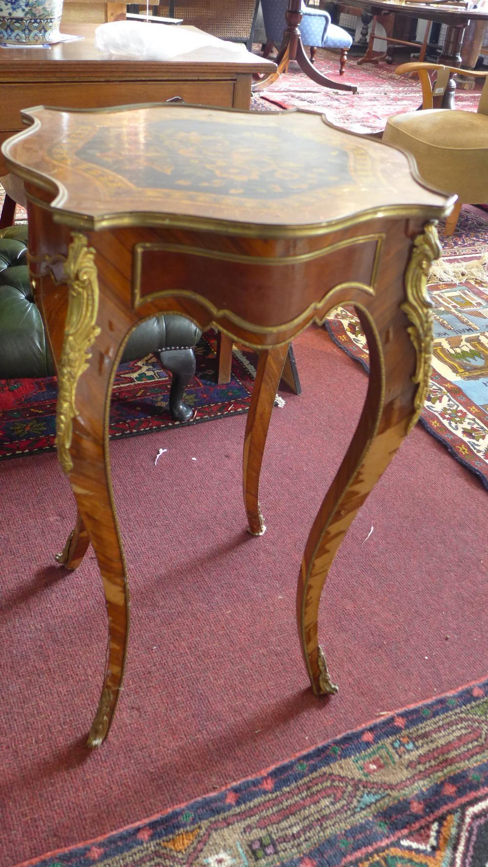 An early 20th century Louis XV style walnut lamp table, with marquetry inlay, having ormolu - Image 2 of 4
