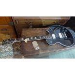 A Hondo II Les Paul style electric guitar, with associated soft case, Condition: missing 1st and 2nd