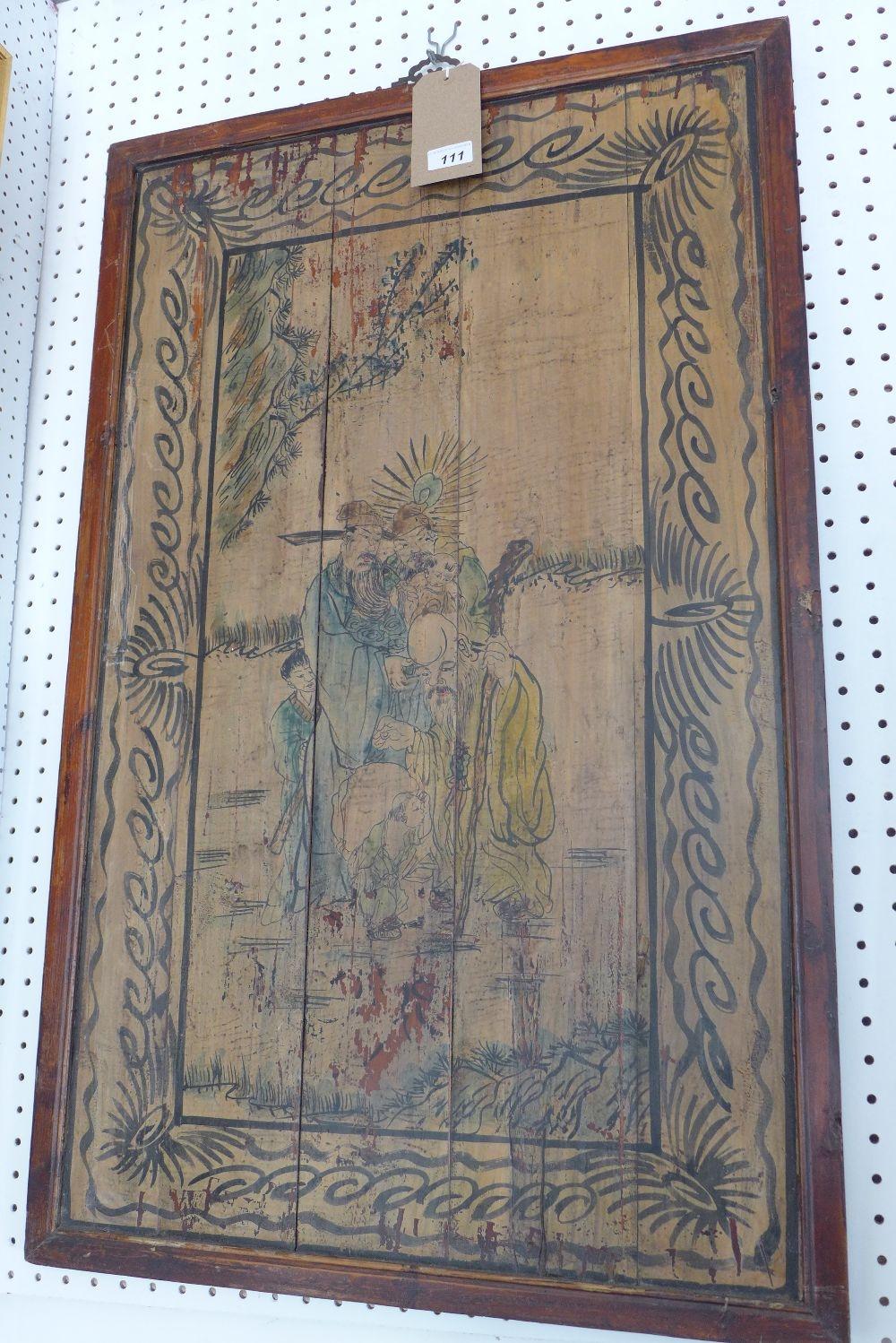 An early 20th century Chinese hardwood panel, hand painted with Lohan and other figures, 98x61cm