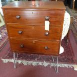 A Victorian mahogany chest of three graduating drawers, raised on hair pin legs, H.108 W.77 D.44cm