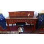 A Regency mahogany executive desk with walnut cross banding, with superstructure having six drawers,