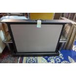 A vintage portable projector screen