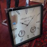 A reproduction McLaughlin & Scott wall clock