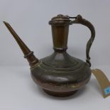 A 19th century Islamic copper and bronze tea pot, signed