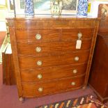 A Regency mahogany chest of two short over four long drawers, brass and boxwood inlaid with rosewood