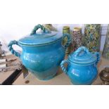 Two Cyan glazed Persian pots with lids, H.40cm (largest)