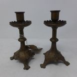 A pair of Art Nouveau brass French candlesticks