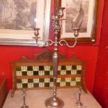 A contemporary chrome four branch, five light floor standing candelabra, H.101cm, together with