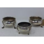 A pair of George II silver salts, London 1756, on three paw feet, H.4.5cm Diameter 8cm, together