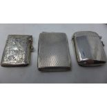 Three silver vesta cases