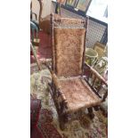 A late 19th century turned mahogany American rocking chair