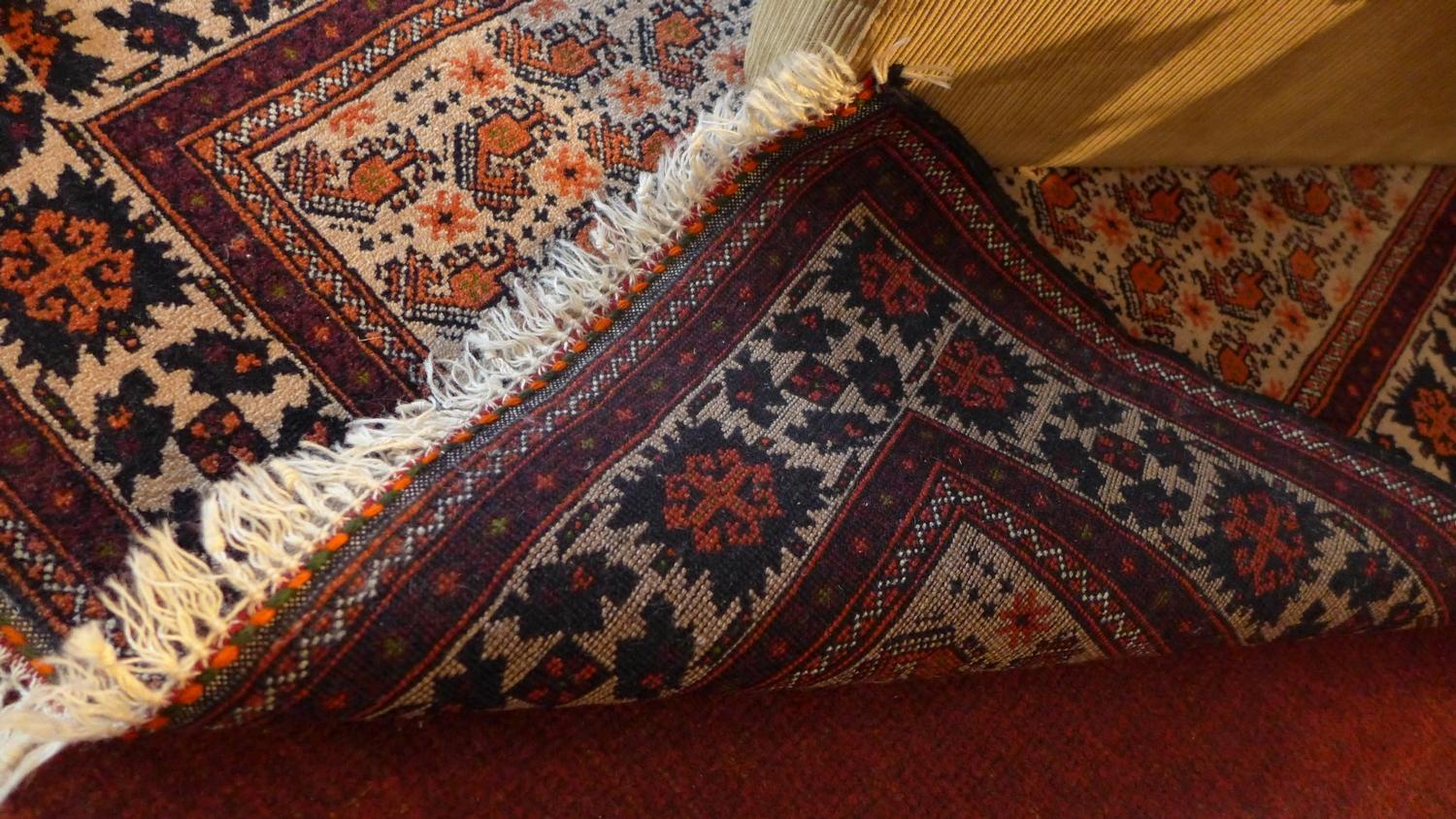 A Baloush rug, with central geometric motifs, on a beige ground, contained by geometric borders, - Image 3 of 3