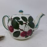 A Wemyss porcelain teapot, decorated with cherries, marked to base, H.11cm