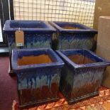 Four brown and blue glazed Gothic style planters, comprising two large, H.41 W.40 D.39cm, and two