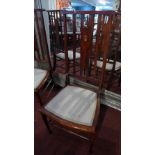 A pair of Art Nouveau inlaid mahogany hall chairs