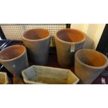 Four earthenware planters of conical form, comprising two large, H.67cm Diameter 52cm, and two