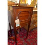 A Georgian mahogany bedside cabinet, with one cupboard door and a single drawers, raised on