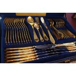 A cased set of Solingen 24k gold plated flatware