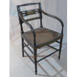 A Regency style ebonized armchair