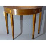 A 20th century mahogany inlaid demi lune console table, raised on tapered legs, H.74 W.91 D.37cm